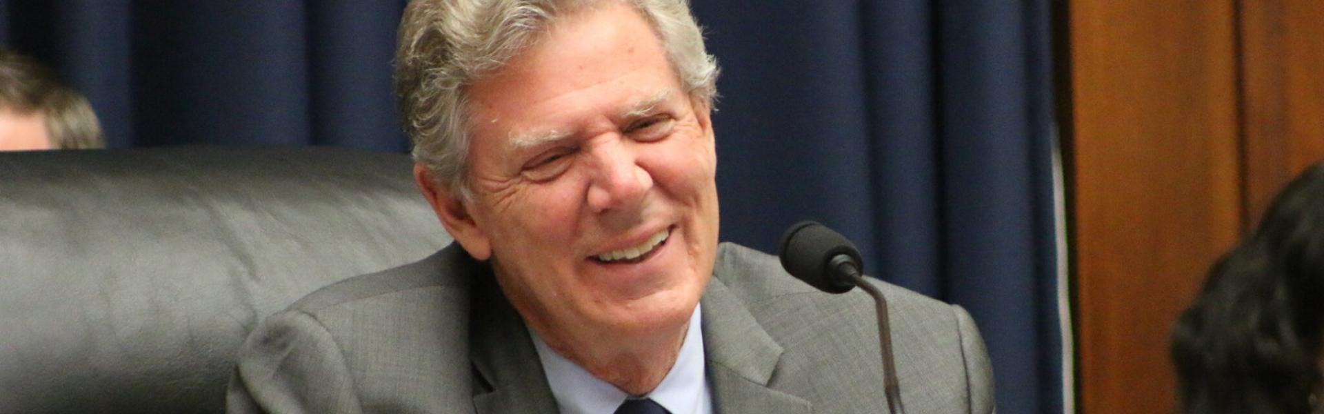 Rep. Pallone smiles at podium